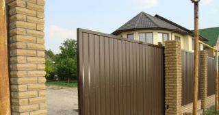 Купить откатные ворота из профнастила Озёрск, цена от 1777 руб.